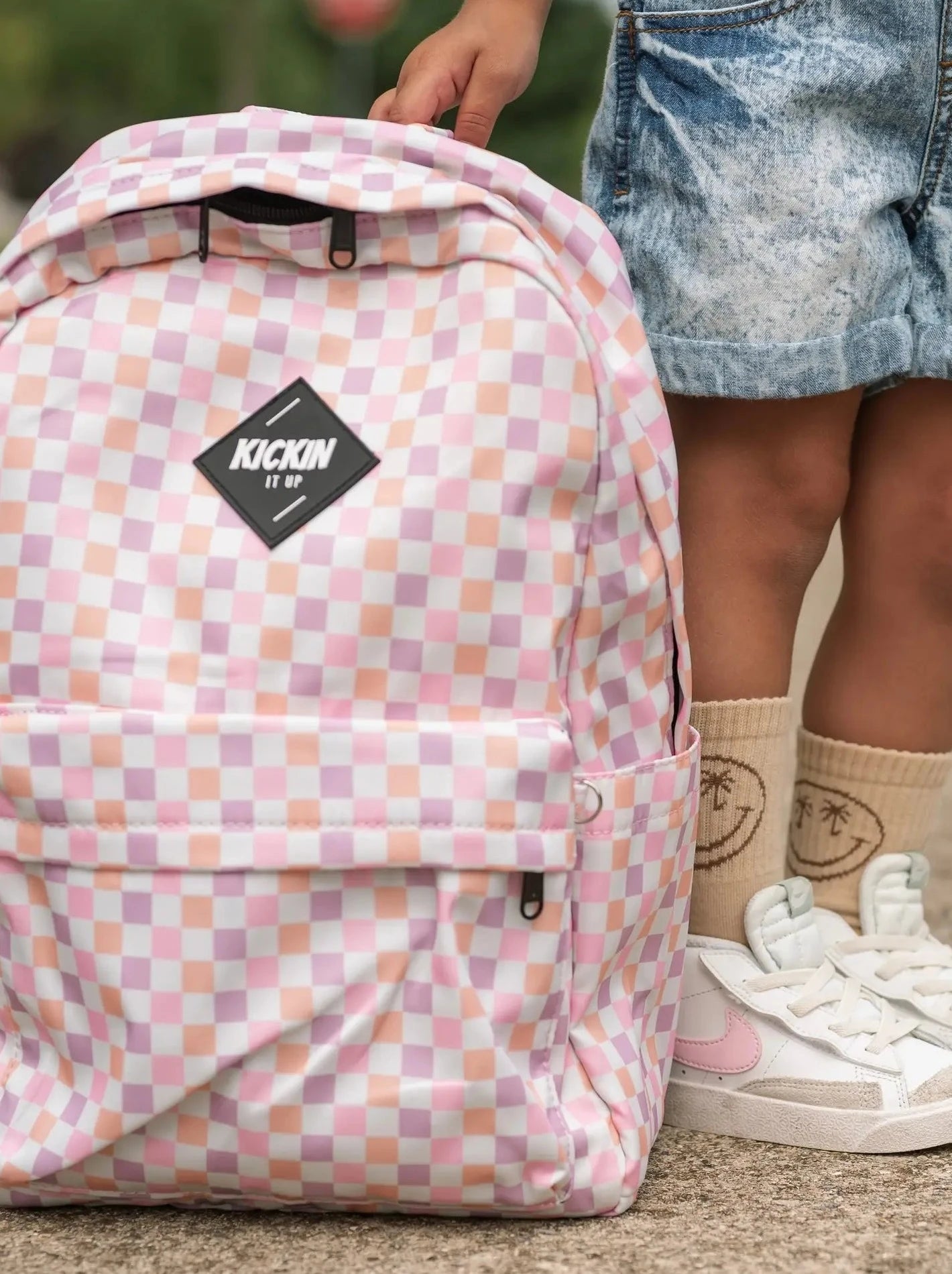 Pink and white checkered backpack hotsell